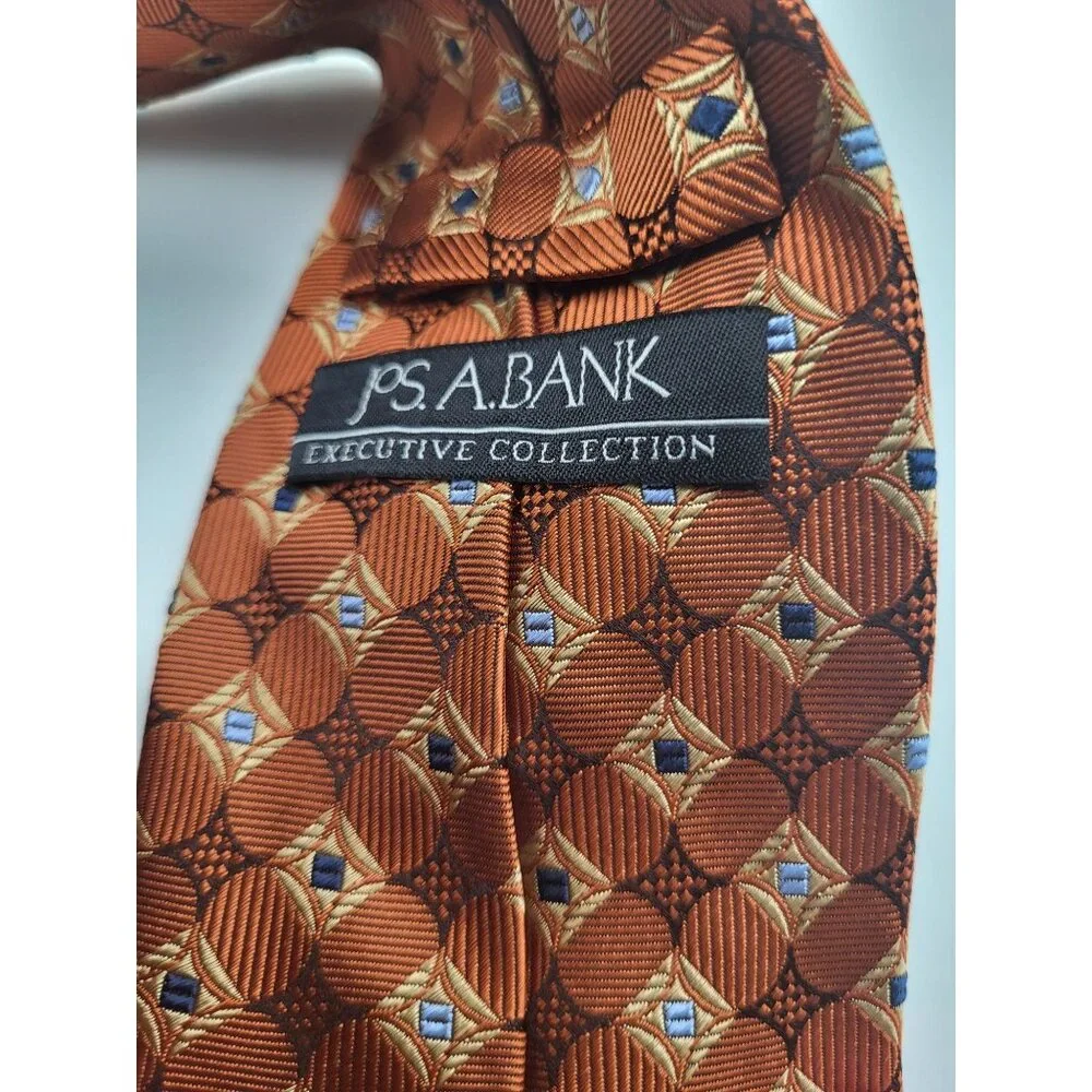 JOS A BANK Men's Geometric Print Rust Orange Blue Neck Tie 100% Silk NWT - Picture 6 of 6